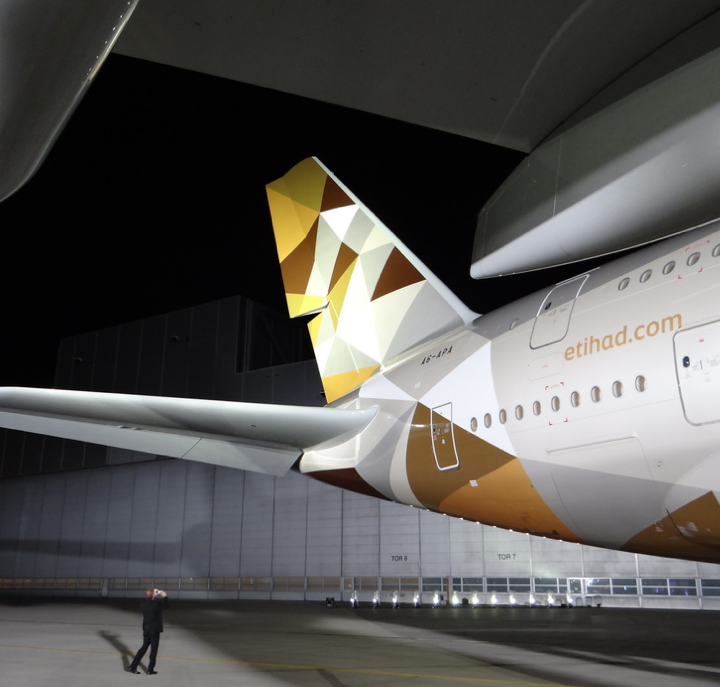 Etihad Altis font on airplane